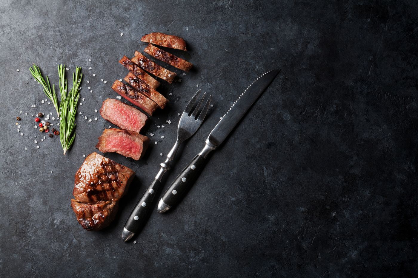 Perfectly cooked grass-fed steak, sliced